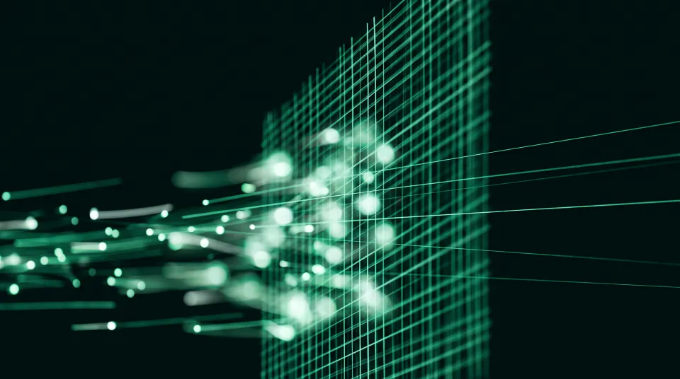 An emerald mesh standing across the frame; most points of light stop against it, a few pass through as clean streaks.